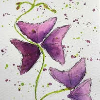 two purple flowers with angled petals