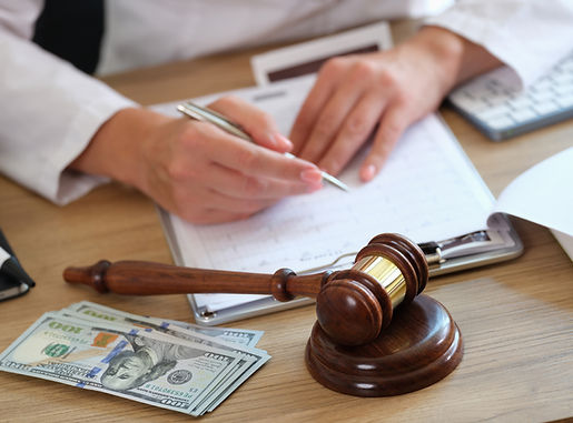 medical-clinic-lawyer-works-with-health-insurance-financial-documents-his-desk-man.jpg