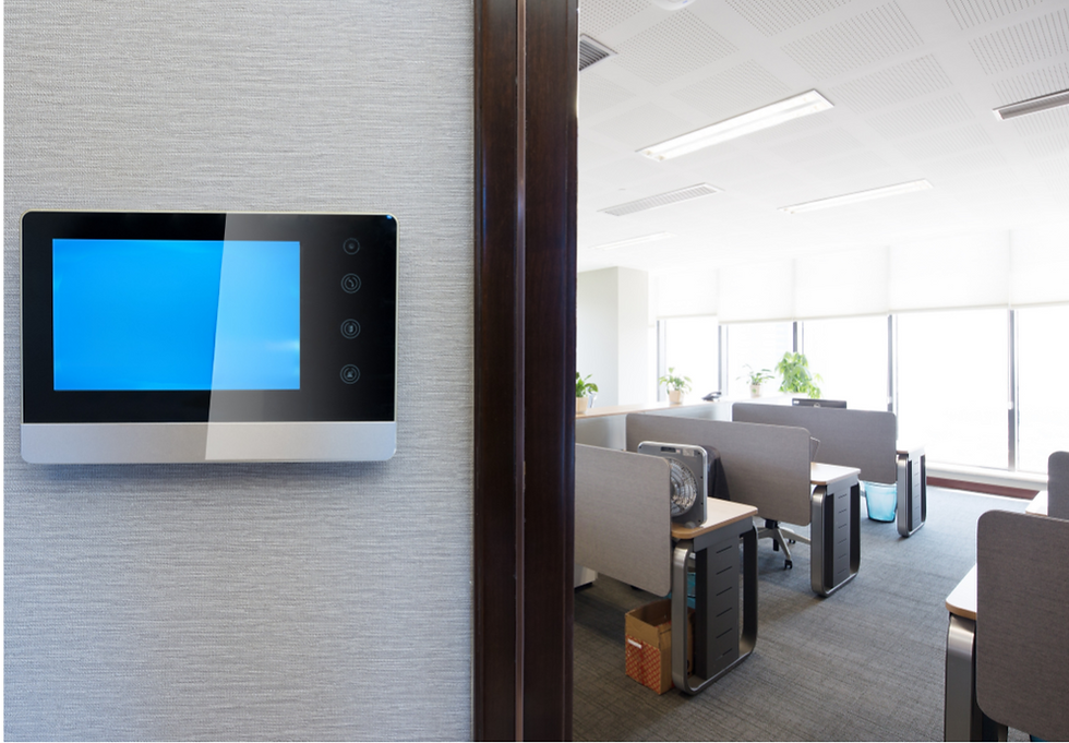 IT workspace showing occupancy sensors and signage