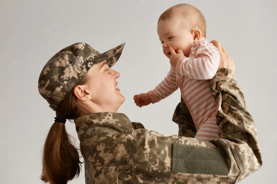 portrait-female-soldier-just-arrived-home-being-so-happy-see-her-infant-daughter-lifting-t