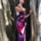 Woman in a Purple Carmen Pareo posing in front of a tree, Angela Artworks