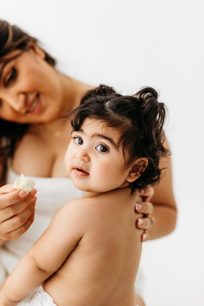 baby girl having a snack