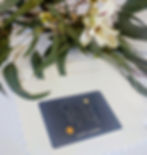 Gift card for Bubles Babies nestled among flowers