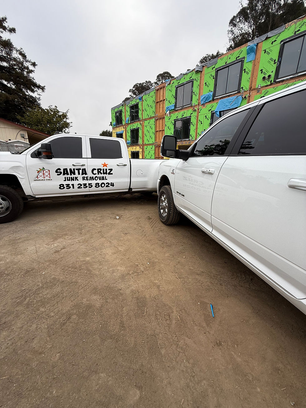 Santa Cruz Junk Removal Trucks on a property commercial cleanup in Santa Cruz County
