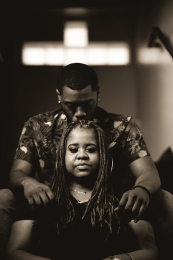Outdoors Photo's of a loving Black couple announcing their pregnancy. Engagement photoshoot in Los Angeles, CA by Rob Kirk Photography