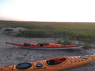Happy Kayaks waiting to take their paddlers back home after exploring the island.