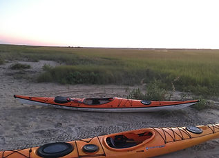 Happy Kayaks waiting to take their paddlers back home after exploring the island.
