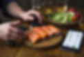 cropped-hands-person-graphing-food-with-mobile-phone (1).jpg