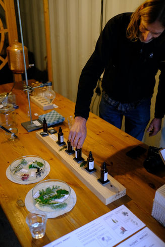 man working in the lab, picking an elixer