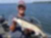 Guided fishing boat on the calm waters of Devils Lake, ready for a fishing adventure with Ancil's Guide Service