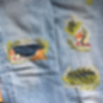 Jeans patched and mended with embroidery