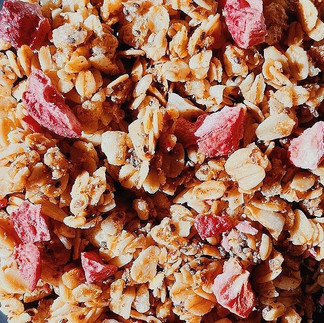 close up of granola with strawberries