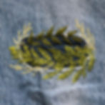Jeans patched and mended with embroidery