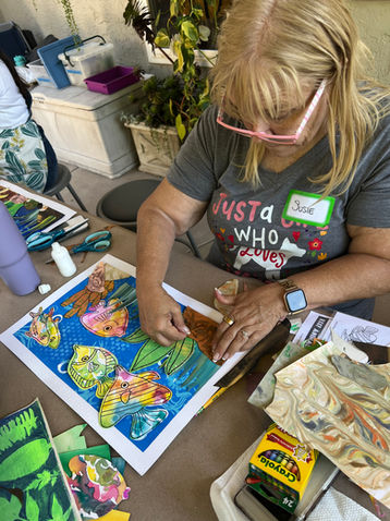 Diane creates colorful fish turtle collage art.