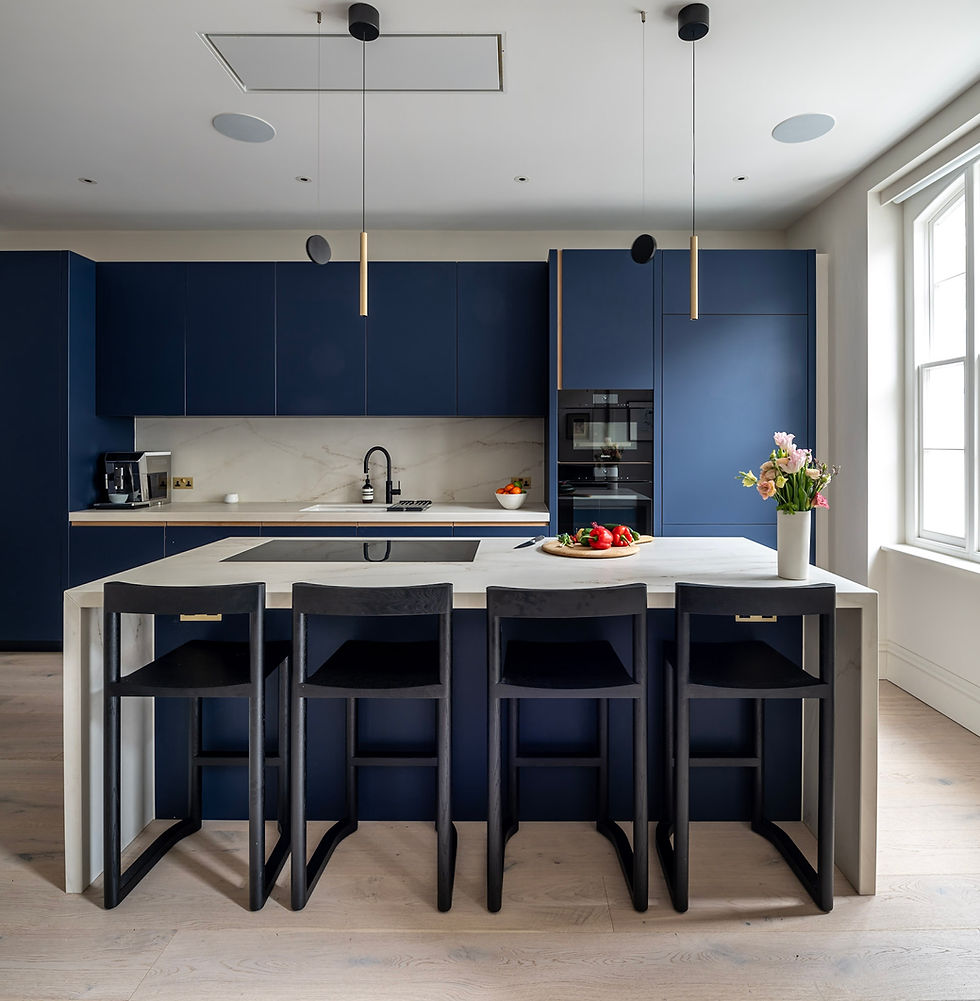 Blue Fenix kitchen cabinetry with integrated oak handle detail