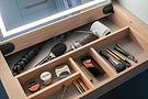 Lift-up dressing table mirror concealing integrated storage with task lighting