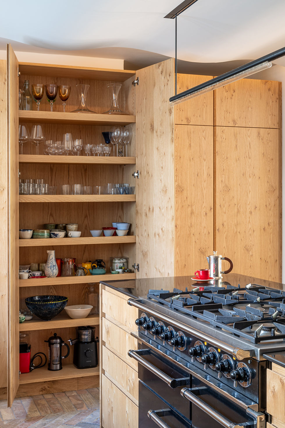Pippy oak kitchen cabinetry with distinctive natural grain