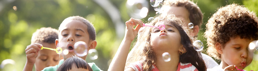 A couple of kids blowing bubbles in Markham
