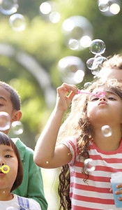Children Blowing Bubbles