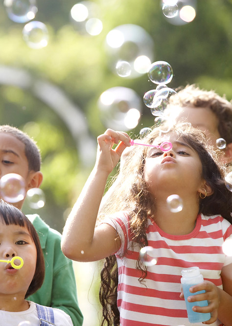 Kids Blowing Bubbles at daycare