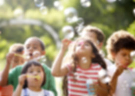 Kids Blowing Bubbles