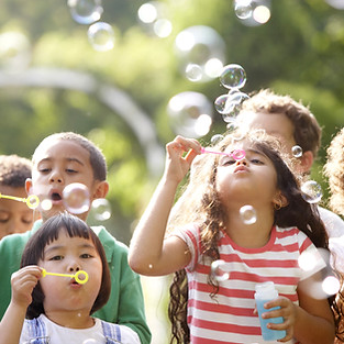 Children Blowing Bubbles
