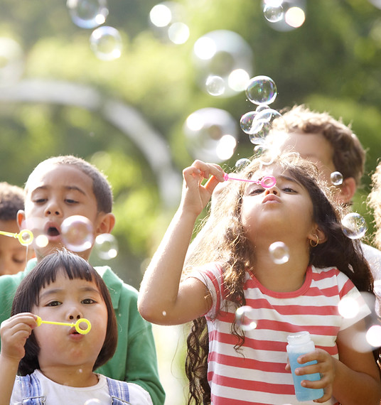 Kids Blowing Bubbles
