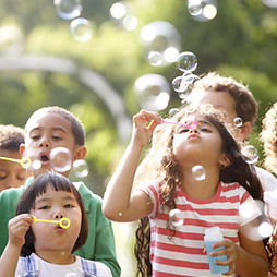 Kids Blowing Bubbles