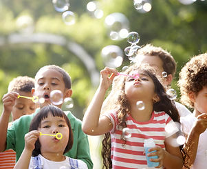 Kids Blowing Bubbles
