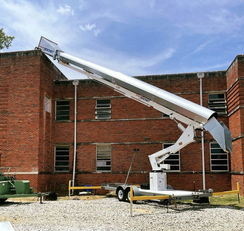 PNW Trash Chute Rentals 50ft chute in action—streamlining rooftop debris cleanup a commercial building Portland OR