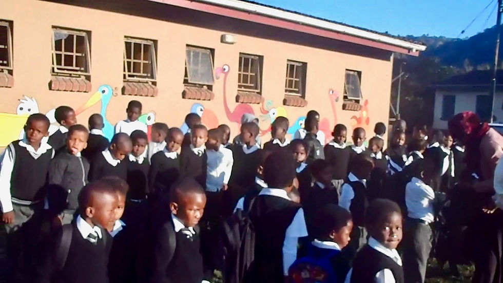 the children celebrate the newly fixed and decorated toilets