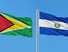 El Salvador and Guyana flags side by side under a clear blue sky, El Salvador e-Tourist visa for Guyana citizens.