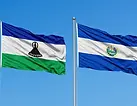 El Salvador and Lesotho flags side by side under a clear blue sky, El Salvador e-Tourist visa for Lesotho citizens.