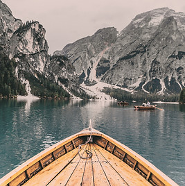 people in brown wooden boat_edited.jpg