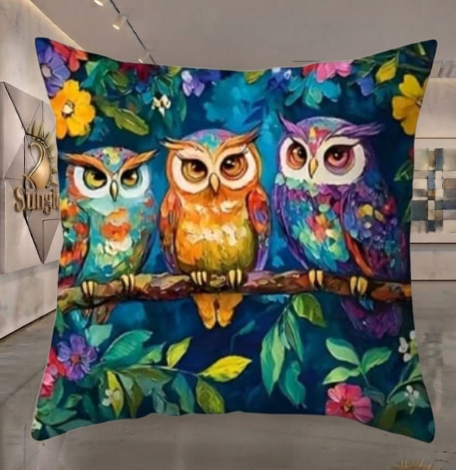 Colorful owl scatter cushions with three owls on a branch