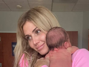 Torrie Wilson and her baby born through surrogacy