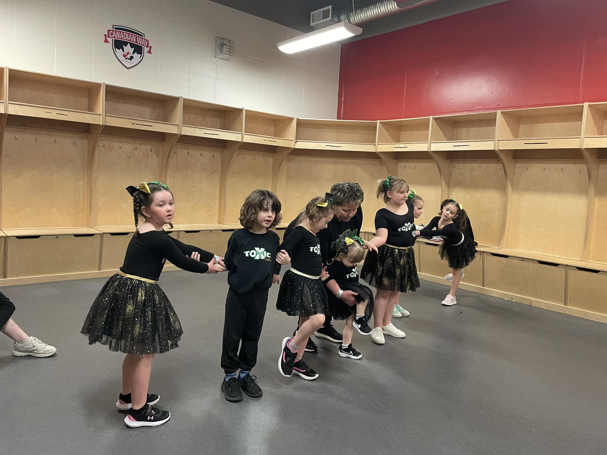 Young Toxic Elite athletes practising in the gym