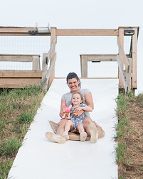 2 people going down giant slide