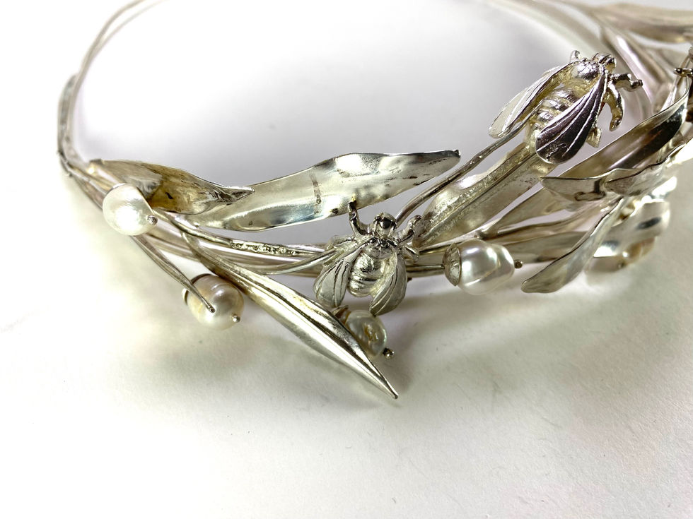 Sterling silver tiara in form of olive leaves with baroque pearls and bees. Silversmith David Salariya, silver maker,
hand-crafted silver, bespoke silver items, silver artisan, silver workshop.