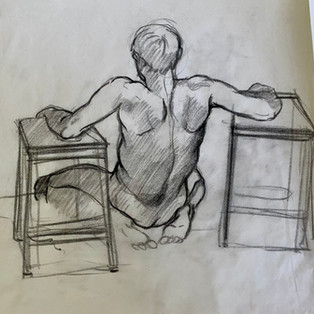 Pencil life-drawing of male model, back view with arms on two stools by Shirley Willis Salariya