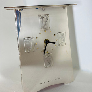 Sterling silver clock case, front with mechanism