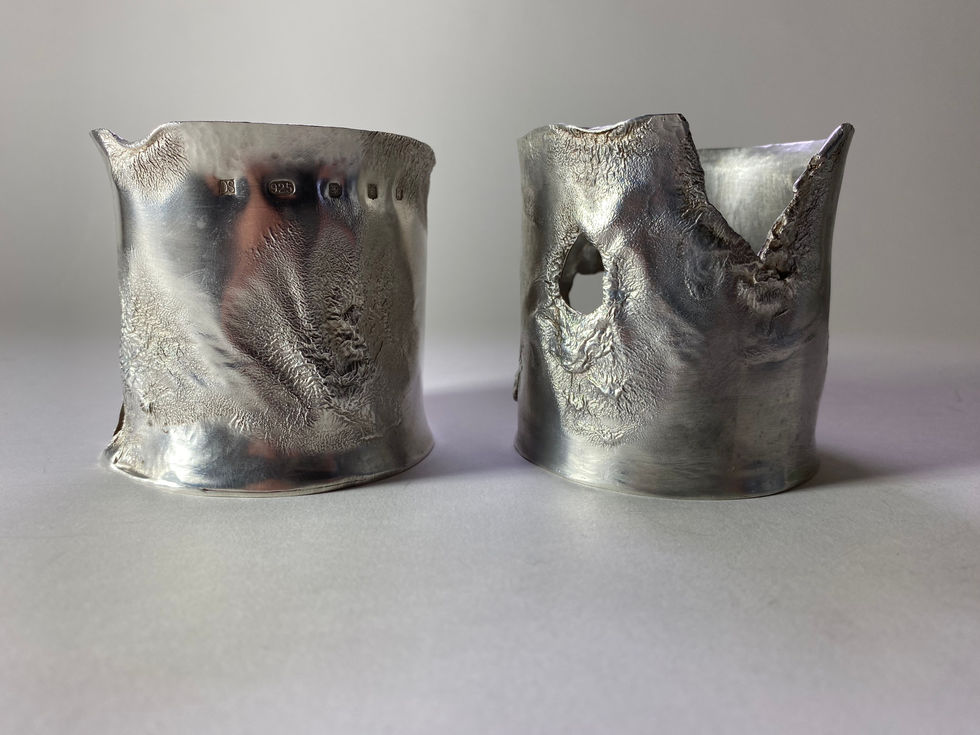 Pair of reticulated sterling silver candle holders. Silversmith David Salariya, silver maker,
hand-crafted silver, bespoke silver items, silver artisan, silver workshop.
