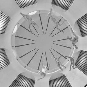 Sculpture of figures inside dome