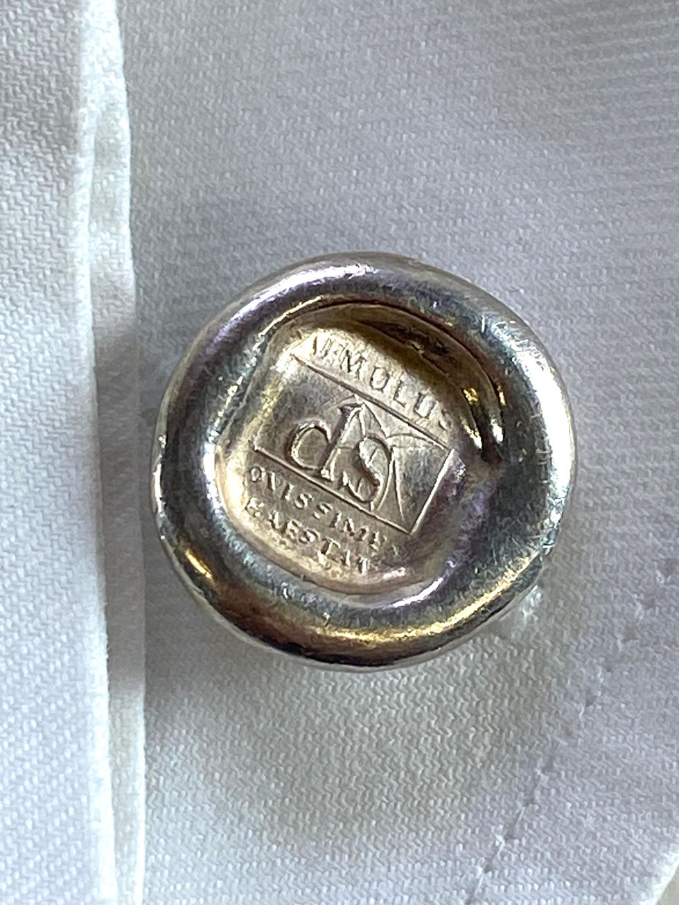Silver cufflinks in style of wax seal. Silversmith David Salariya, silver maker,
hand-crafted 925 silver, bespoke silver items, silver artisan, silver workshop.