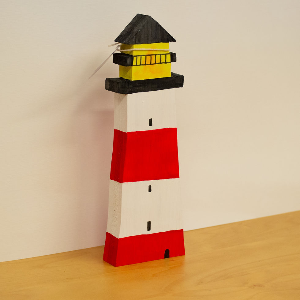 Miniaturbild: Holzfigur roter Leuchtturm