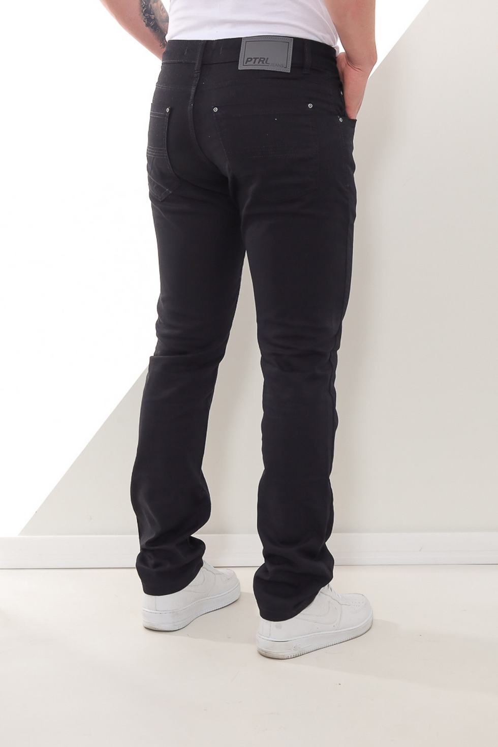 Miniatura: Calça jeans skinny masculina preta.
