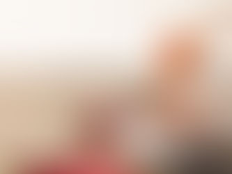 Hot Chilli Honey being drizzled into a ceramic bowl with h