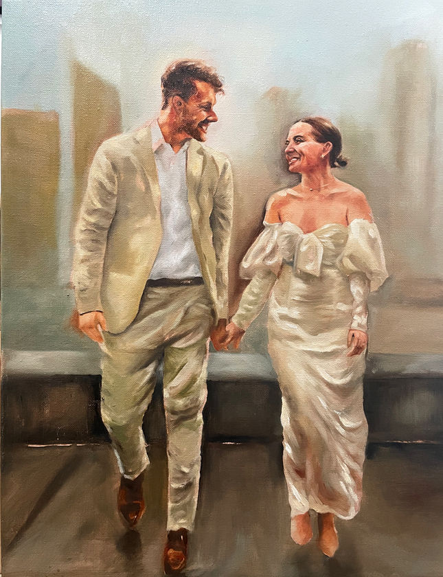 Live wedding painting of a couple walking hand in hand in elegant ivory attire, city skyline behind them