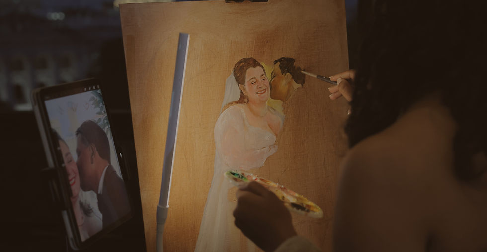 Live wedding painter in Toronto painting a couple's portrait on canvas at their wedding