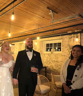 Toronto live wedding painter Renu with the couple during their emotional painting reveal at Cambium Farms